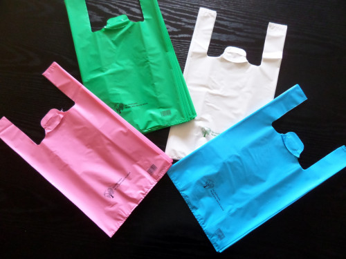Sac bretelle plastique rose 26x45 cm 50 microns (500 pièces)